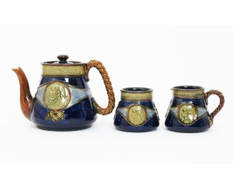 A Royal Doulton stoneware Lord Nelson commemorative tea set, modelled in low relief with a roundel of The Victory, and a port