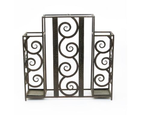 A patinated metal umbrella stand/hall console in the style of Edgar Brandt, with marble shelf and loose drip trays, 71cm. wid