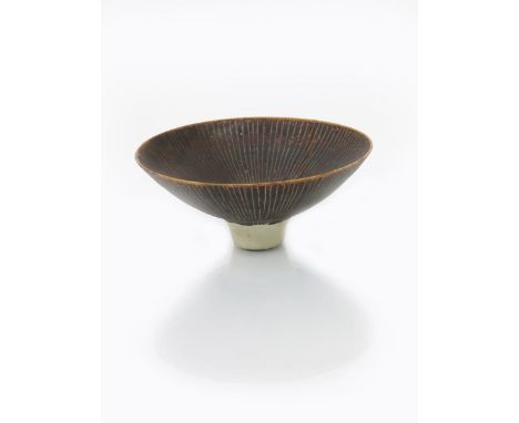 &bull;Dame Lucie Rie D.B.E (1902-1995) a flaring bowl, decorated with fine sgraffito lines in manganese on a buff ground impr