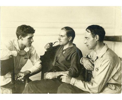 KARL BULLA (1855-1929), Portrait of the Photographer's Son,portrait of Victor Bulla (1883-1938) in conversation with two men,