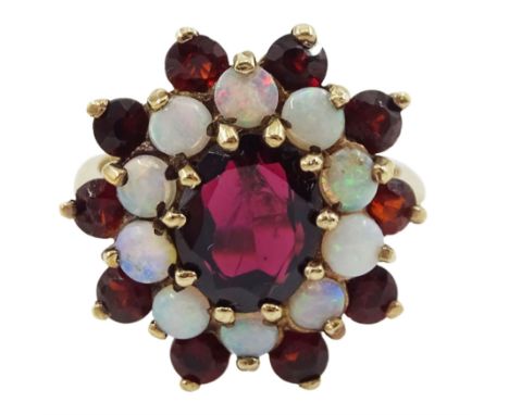 9ct gold garnet and opal cluster ring, hallmarkedCondition Report:Approx 4.65gm, size K-L, head = 18mm x x18mm, good conditio