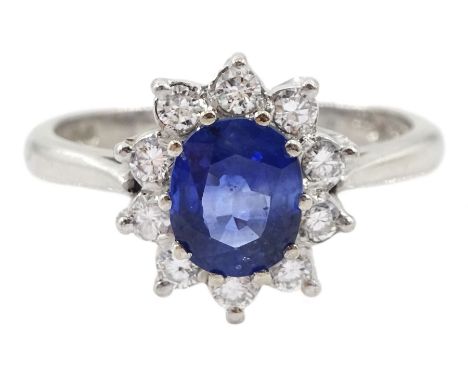 18ct white gold oval sapphire and round brilliant cut diamond cluster ring by Boodles, London 1981, sapphire approx 1.13 cara