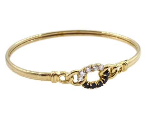 9ct gold cubic zirconia openwork design bangle, hallmarkedCondition Report:Approx 6.9gm, body testing magnetic probably lined