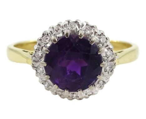 Gold round amethyst and diamond cluster ring, stamped 18ctCondition Report:Approx 3.4gm, size N-O, head diameter = 1mm, ameth