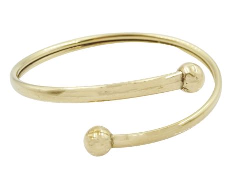 9ct gold crossover torque bangle, hallmarkedCondition Report:Approx 7.75gm, overall good condition, a couple of very light de
