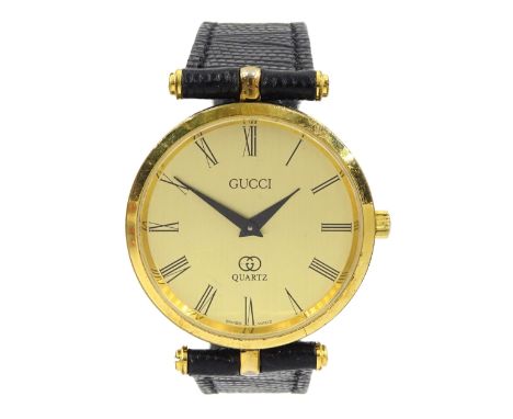 Gucci Shelly Line quartz wristwatch, gilt dial with GG logo back case, boxedCondition Report:Movement not currently working (