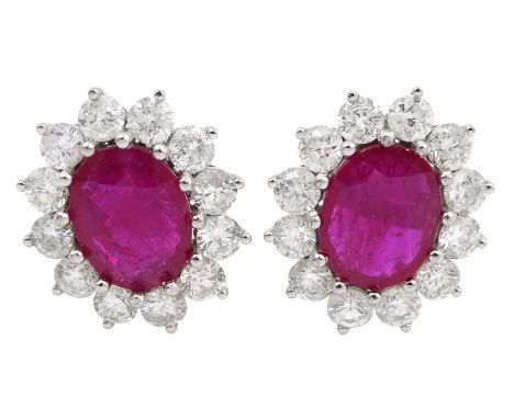 Pair of 18ct white gold oval ruby and round brilliant cut diamond stud earrings, stamped 18K, total ruby weight approx 3.15 c