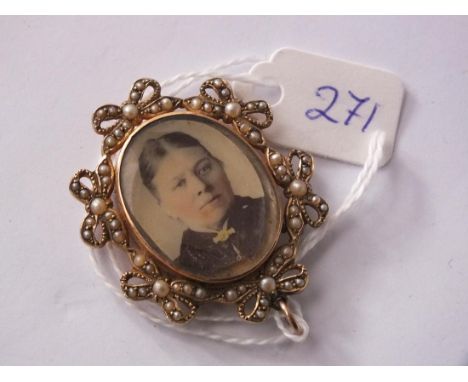 Antique 9ct double photo locket in bow mount  decorated with seed pearls 4cm long     