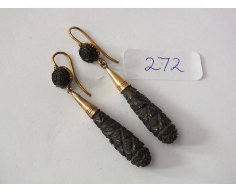 Pair carved jet earrings with gold mounts  length 5cm        