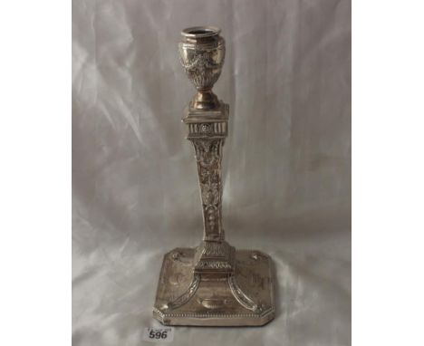 Tall Neo Classical symbol candle stick, embossed with  rams masks, 12" high Shef 1901      