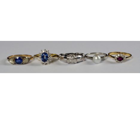 A collection of five rings, to include a French 18ct gold sapphire and diamond ring, c.1920s, the central sapphire flanked by