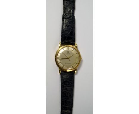 An Omega Seamaster automatic 18ct gold cased gentleman's wrist watch, c.1960s, silvered dial with gold batons, Arabic numeral