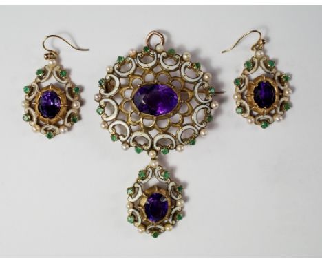 An impressive 9ct gold, amethyst, emerald, seed pearl and white enamel brooch and earrings, in Suffragette colours, early 20t