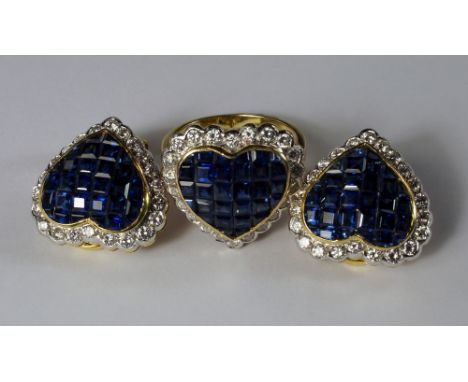 An 18ct gold, sapphire and diamond set ring and earrings suite, square cut invisible set sapphires in a heart form, bordered 