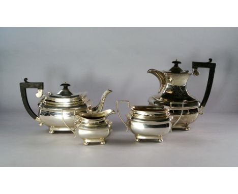 A four piece silver tea service, Birmingham 1928, Joseph Gloster Ltd, of Regency style, comprising teapot, hot water pot, mil