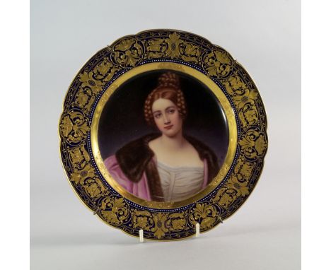 A Vienna porcelain plate by H. Brodil, 19th century, painted to the centre with a beautiful young woman, her red hair in comp