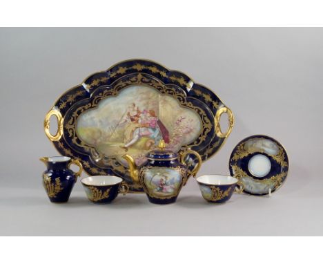 A Sevres porcelain part cabaret set, 19th century, painted with reserves of courting couples in the Rococo revivalist taste a