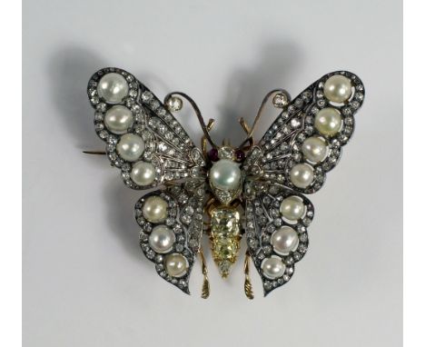 A spectacular large diamond, yellow diamond and natural pearl butterfly en tremblant brooch,  the openwork design wings encru