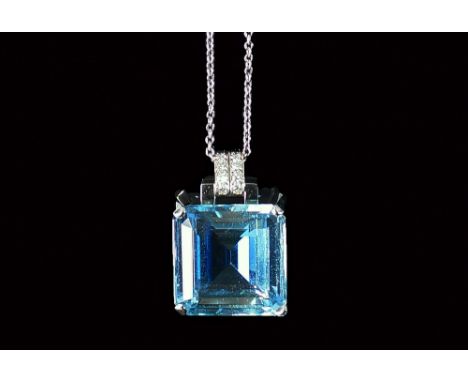 Cartier: An impressive aquamarine and diamond pendant, the square step cut natural aquamarine approx 22.47ct, colour, very li