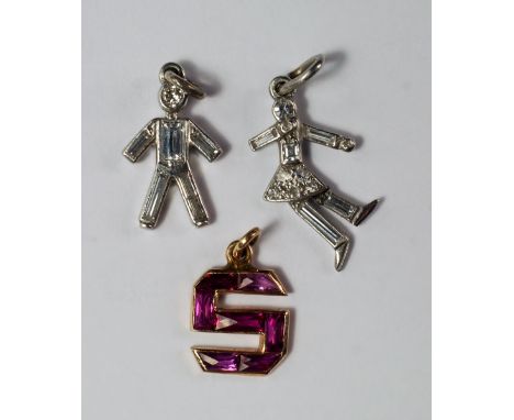 Cartier: A platinum and diamond charm of a stylized boy, with old cut and baguette cut diamonds, stamped Cartier London, appr