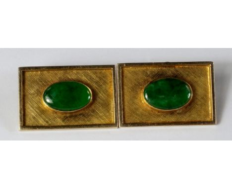 A pair of 14ct gold and jade gentleman's cufflinks, of knurled oblong form, each set with an oval green jade stone, approx 2.