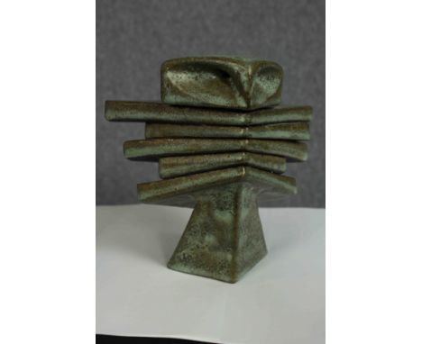 A modern ceramic owl figure. Abstract. Signed on the base with the artist's seal. H.18 W.14 D.14 cm. 