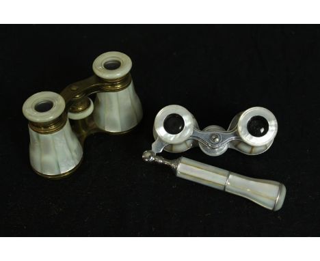 Two pairs of mother of pearl opera glasses. One with a telescopic handle. Each measure W.12 D.7 cm. 