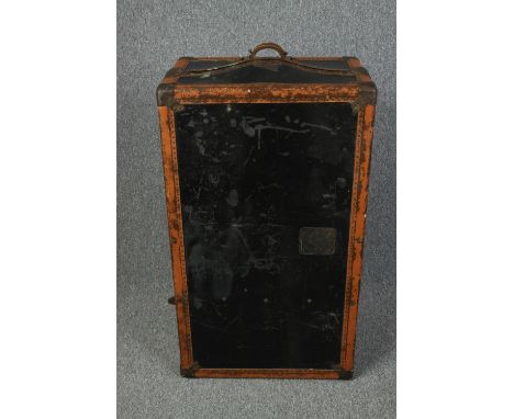A vintage fitted leather and metal bound steamer trunk. H.100 W.58 D.43cm. 