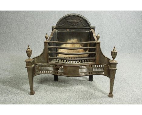 Fire Grate, early 19th century steel in the Adam style. Stamped to the back.&nbsp; H.75 W.80cm. (Comes with a sales invoice f