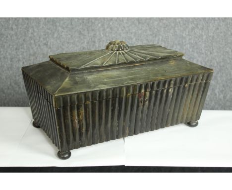 An early 19th century Anglo-Indian horn sarcophagus form tea caddy. With two compartments and a mixing space. Each compartmen