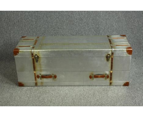 An Aviator style trunk fitted with a base drawer and leather handles and fastenings. H.44 W.120 D.40cm. 