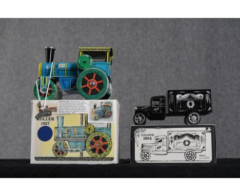 Road Roller. Czechoslovakian tin litho wind up toy and a hearse. Both boxed. H.15 W.12 D20 cm.