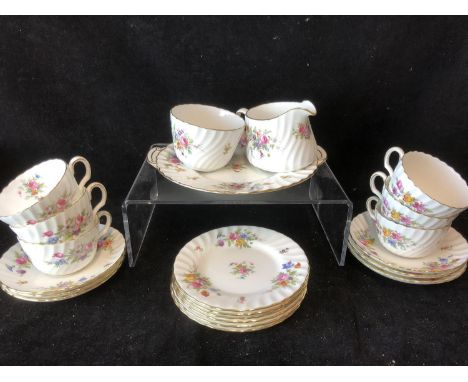 A Minton Marlow pattern tea service, floral design, comprising 6 cups, 6 saucers, 6 plates; cake plate; milk jug and sugar ba