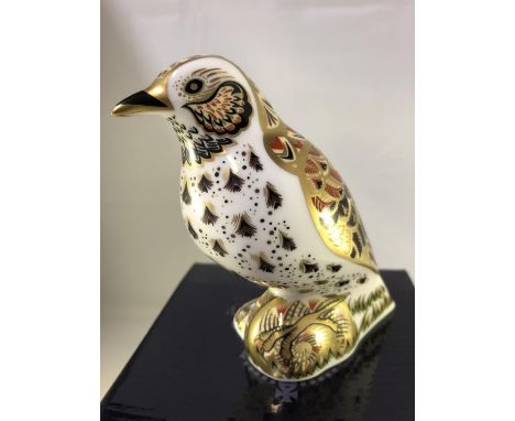 Royal Crown Derby porcelain - An Imari Song Thrush bird paperweight, gold button, dated 2003, original box, 11cm max 