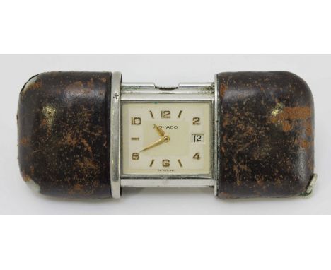 A Movado Ermeto leather wrapped retractable purse watch, the dial with gilt detailing and date aperture, reference number to 