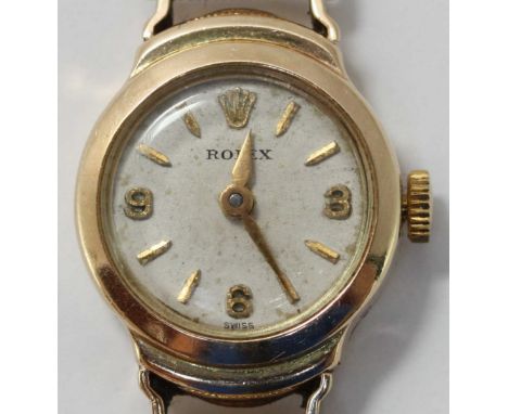 A 9ct gold Rolex ladies cocktail watch, the silvered dial with Arabic numerals at the 3, 6 and 9 o'clock positions and on ori
