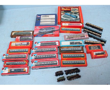 A collection of assorted Hornby model railway trains and other related items, including Skaledale St James' parish church and
