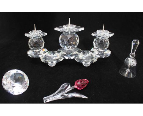 A Swarovski Silver Crystal three sconce candelabra, together with a Pink Tulip, diamond shaped crystal and a small bell, ref 