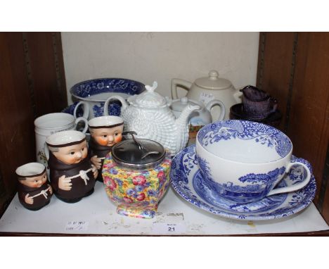 SECTION 21. A group of assorted ceramics, including three Hummel Monk pouring jugs, a white Clarice Cliff teapot, two large b
