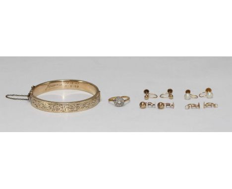 An 18ct gold ring with a missing central stone, four various sets of 9ct gold earrings and a 1/5th 9ct gold stiff, hinged ban