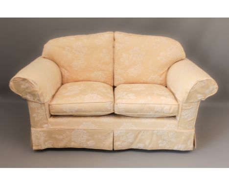 A good quality two-seater sofa - upholstered in pale gold floral and foliate damask. (LWH 160 x 89.5 x 88cm)