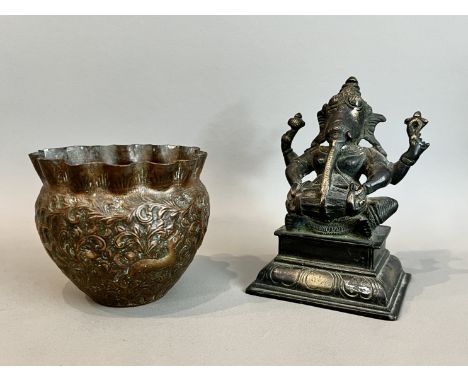 Two Indian pieces, comprising - 1. A bronze figure of Ganesh, unusually modelled with the trunk hanging straight forwards, se