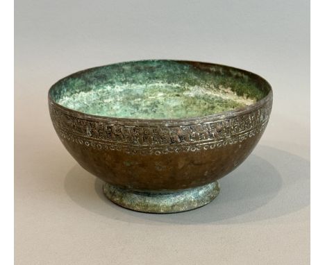 An antique middle eastern tinned bell metal vessel - probably 19th century, of cupped form with a flared foot, the rim with a