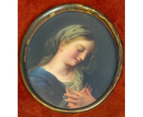 A hand painted porcelain plaque of the Virgin Mary - oval, probably 19th century, old paper label to reverse of plaque from '