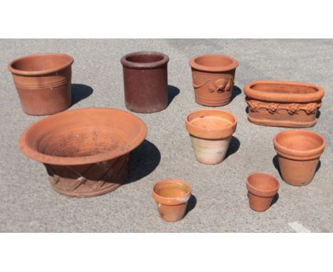 Eight terracotta and one other planter - the largest 56 cm diameter x 23 cm high