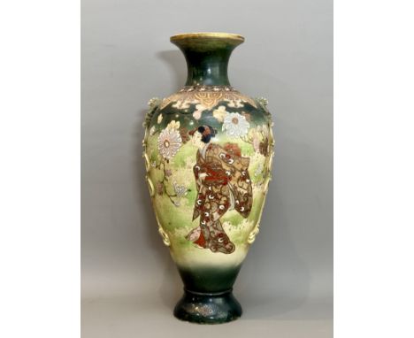 A large Japanese earthenware Satsuma vase - 1920s-30s, of baluster form with twin winged beast and lucky knot handles, painte