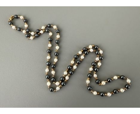 A pearl, yellow metal and hematite bead necklace - with 5mm pearls and 6mm hematite beads, with 18ct gold lobster claw clasp 