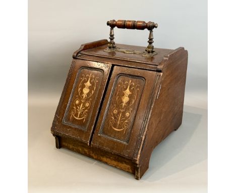 An Edwardian mahogany and marquetry patent coal scuttle with mechanical mechanism - the pair of panelled front doors inlaid w