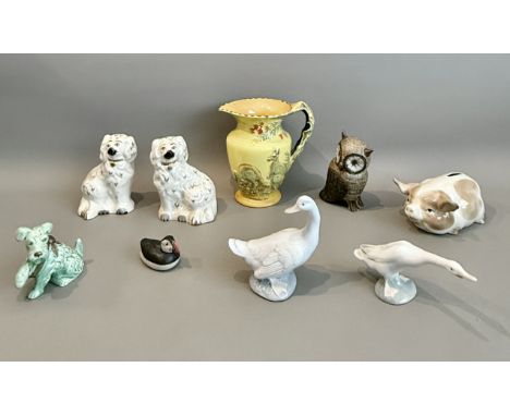 A small group of china and porcelain animal figures - including a studio pottery stoneware owl by Audrey ??, Martinstown, Dor