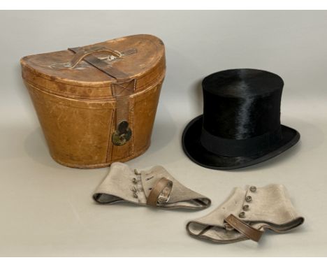 A good quality black silk top hat in a tan leather case - large size (internal measurements 21 x 17.3cm; the box also contain